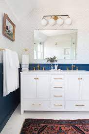 The rest of the room is left white with just a few neutral accents to let the marble shine. 16 Easy Bathroom Upgrades That Don T Require A Gut Job