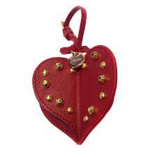 Ceci n'est sans doute pas nouveau; Bijou De Sac Prada Christmas Trick En Cuir Rouge