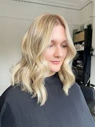 Golden blonde balayage with soft waves