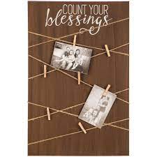 This wall art brings a homey feel to your living room or kitchen with its wood panel print and heartwarming quote. Count Your Blessings Memo Board Hobby Lobby 1652452