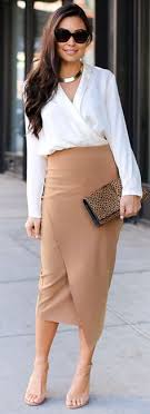 Most recently, blogger pamhetlinger of thegirlfrompanama.com wore her. Camel Skirts
