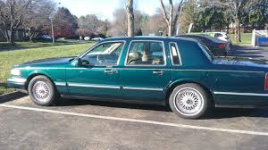 Image result for Light Cypress 1997 Town Car