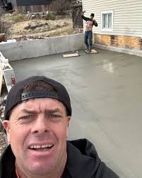 Pouring a concrete driveway with thick borders and finishing techniques