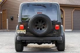 Image result for Brilliant Black 2003 Jeep