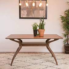 Inspired by the timeless beauty of mid century modern, this table looks right at home set in a small eat in kitchen or bistro. Amazon Com Mabel Natural Walnut Finish Wood Mid Century Modern Dining Table Tables