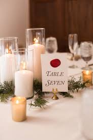 Simple Table Decor For A Wedding Or Event White Pillar Candle Wedding Centerpieces Candles Gold Candle Wedding Centerpieces Pillar Candle Centerpiece Wedding