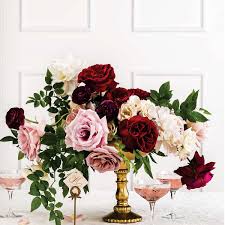 Roses and red carnations wedding bouquets. 15 In Season Winter Wedding Flowers