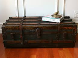 Not only do they add a bit of vintage style to the room, but they're also roomy enough to store stuff like extra blankets, books, magazines, electronics, dvds, or anything else you don't want to keep out in the open for everyone to. Vintage Trunk Coffee Table