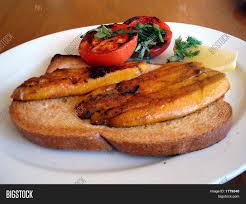 The heart of the full breakfast is bacon, eggs, and sausages (also called bangers in the u.k.). Kippers Breakfast Image Photo Free Trial Bigstock