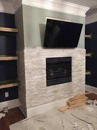Fireplace wall fireplace design fireplace ideas grey stone fireplace double fireplace ledger stone fireplace modern fireplace tiles fireplace gallery stacked stone panels. Tiling A Stacked Stone Fireplace Surround Bower Power