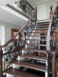 Wrought iron stair railing house design foyer decorating staircase railings railing design natural oak hardwood flooring staircase design stair railing design house stairs. Iron Staircase Design Pictures