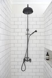 Subway tile with black grout bathroom. Pin By Brittany Potter On Bathrooms White Bathroom Designs Black Shower Fixtures Bathroom Design