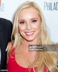 Kristen Munroe and David Boreanaz pose at the David Boreanaz Cover... News  Photo