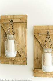 This video tutorial will help you in making hanging jar candle lights! Remodelaholic Diy Rustic Mason Jar Candle Holder