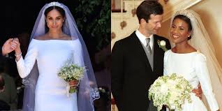 The wedding dress, bridesmaids' dresses and page boys' uniforms. Was Meghan Markle S Dress Inspired By Another Royal