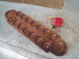 The board is 17.5 inches in length and 5.5 inches in width, consisting of twelve small rules to play mancala board game. Brian S Mancala Board The Wood Whisperer