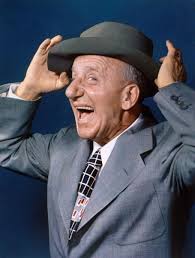 Visiting the grave of a beloved family member at Holy Cross Cemetery