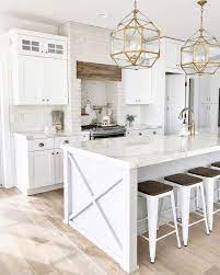 Kitchen Faucet Brass Kitchen Faucet Kitchen Faucet Is Delta Cassidy Single Handle Pull Down Sprayer K White Kitchen Design White Kitchen Decor Kitchen Design Here are 23 white kitchen designs without wood floors to inspire your new home or remodel project!