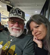 What is a person doing walking around Astoria IL at 1:30 in the morning  with a duffel bag?