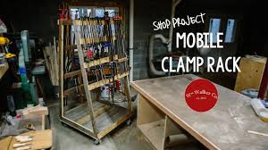 Homemade rolling storage rack constructed from angle iron, tubing, and casters. How To Build A Mobile Clamp Rack Youtube