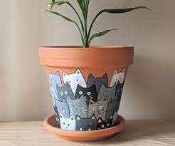 Terracotta gives our gardens and balconies a mediterranean look that reminds us of the mediterranean climate all year round. Painted Cats Terracotta Flower Pot 7 Steps With Pictures Instructables