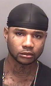 Police charge man in murder investigation