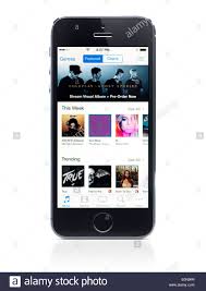Apple Iphone 5s With Itunes Music Store On Its Display