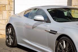 Image result for Lightning Silver 2009 Aston Martin