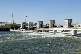Le pont barrage sera mis à sens unique de l'e25 vers l'île monsin du 26/11/2018 au 27/11/2018. Bureau Greisch Renovation Du Barrage De Monsin