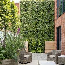 Attach the flashing to the wall with wood screws, using the chalk line as your guide. A Living Wall Makes A Dramatic Vertical Garden Ideal Home