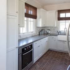 Stainless steel countertops make a great prep space in commercial kitchens! 75 Beautiful Brick Floor Kitchen With Stainless Steel Countertops Pictures Ideas December 2020 Houzz