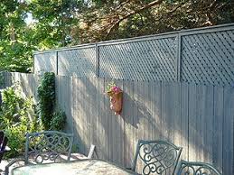 A fence topper is an easy choice as it is specifically designed to sit atop your current fence. Privacy Fence Landscaping Backyard Fences Privacy Fence Designs