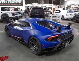 Lamborghini Huracan Performante Black And Blue Lamborghini Huracan Performante Painted In Blu Ageus W Tricolore Stripes Along The Doors And A Set Of Adv 1 Center Super Cars Lamborghini Huracan Luxury Cars