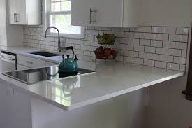 Get this look with msi's arctic white quartz (photo credit: Clean White Kitchen Cabinets And Quartz Countertops