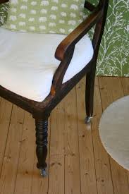 Subtly winged sides and faux leather upholstery play up this chair's traditional character, while nailhead trim rounds out the look with a decorative touch. Pin On Desk