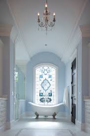 Traditional bathroom with stained glass windows beautiful, gothic style stained glass windows make a dramatic statement in this traditional bathroom. 18 Stained Glass Windows To Show Your True Colours Houzz Au