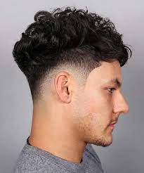 You can go with a taper fade hairstyle for curly hair with something unique. The Most Popular Taper Haircut Curly Hair Kipperkids Com