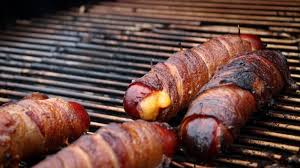 Until the bacon is cooked. Maple Smoked Bacon Wrapped Cheese Stuffed Hot Dogs Recipe Wildwood Grilling