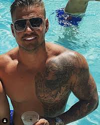 He naturally has blue eyes and brunette hair. Who Is Carl Woods Katie Price S Fiancee And Former Love Island Star
