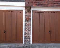 A sectional door is made up of horizontal panels which lay parallel with the garage roof when open. Garage Doors Wokingham Repairs Supply Garage Doors Wokingham Uk