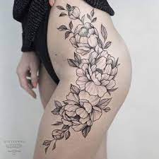 The flower thigh tattoos in this piece are bright red, contrasting with what could be a black raven as pictured above. 27 Floral Thigh Tattoos Ideas Floral Thigh Tattoos Tattoos Hip Tattoo