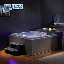 The voltage of a hot tub is higher (usually around 240 volts) than regular home outlets, so you will need to install a breaker to your electrical control box. Joyee Hot Tub Surround Serc Acrylic Indoor Small Free Standing Wood Saoking Bath Tub With Massage Whirlpool Buy Small Free Standing Bath Tub Wood Soaking Tub Hot Tub Surround Product On Alibaba Com