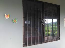 Check out our iron window grate selection for the very best in unique or custom, handmade pieces from our home & living shops. Mi Chunche Spanish Style Wrought Iron Bars On Windows And Doors