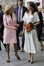 Brigitte Macron The Wife Of French President Emmanuel Macron And Danish Crown Princess Mary Arrive For A Crown Princess Mary Princess Mary Chic Summer Style