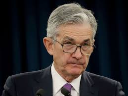 US Fed chief Powell plays down recession fear while leaving rate cuts