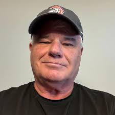 Coach Shank takes helm of Trojans softball, looks to build competitive  program