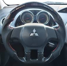 The eyelids are made using grade a fiberglass and come unpainted. Mitsubishi Eclipse 3g And 4g Carbon Fiber Custom Steering Wheel Socal Garage Works