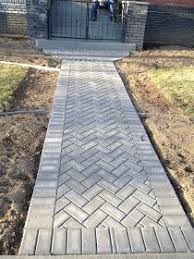 Brick is a material that can appear casual or formal depending on how it is laid. Babs A Little Help For My Yard Patio Pavers Design Paver Sidewalk Walkway Landscaping
