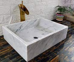 Stone sinks bathroom vanities are very popular among interior decor enthusiasts as they allow for an added aesthetic appeal to the overall vibe of a property. Carrara White Sinks Bathroom Marble Stone Sinks Bathroom Vanity Tops