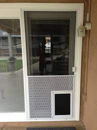 Shop for screen doors and find the right style and colour for your property. Imperial Grille And A Pet Door Screen Doors Window Screens